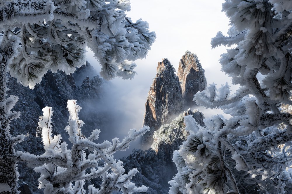 Majestätische Wintergipfel von Chuanxu Ren