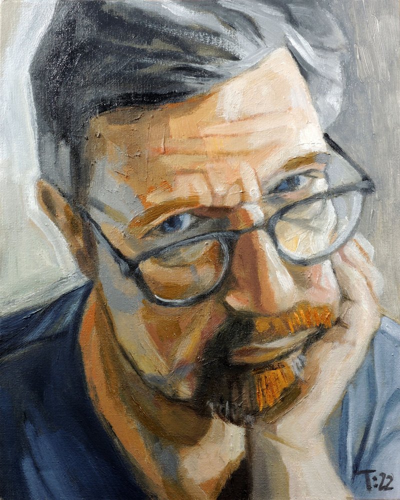 Nachdenklicher Mann mit Brille von Tore Bahnson