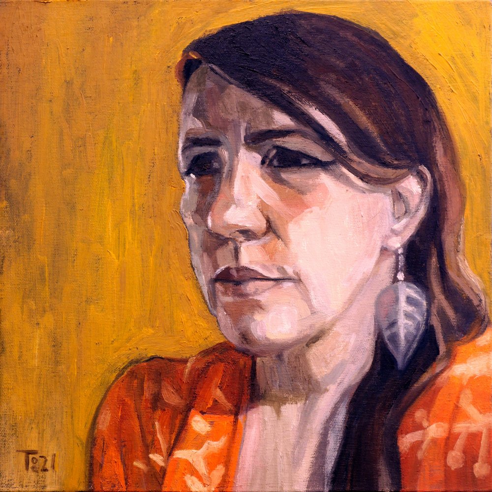 Nachdenkliche Frau in Orange von Tore Bahnson
