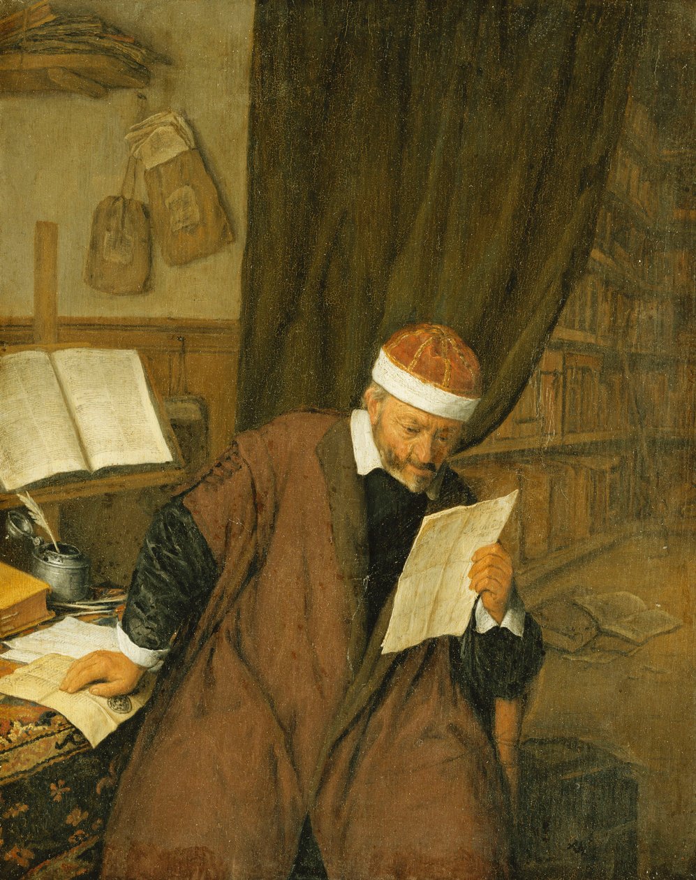Ein Anwalt, der an einem Schreibtisch sitzt und einen Brief liest, eine Bibliothek dahinter, 1668 von Adriaen Jansz. van Ostade