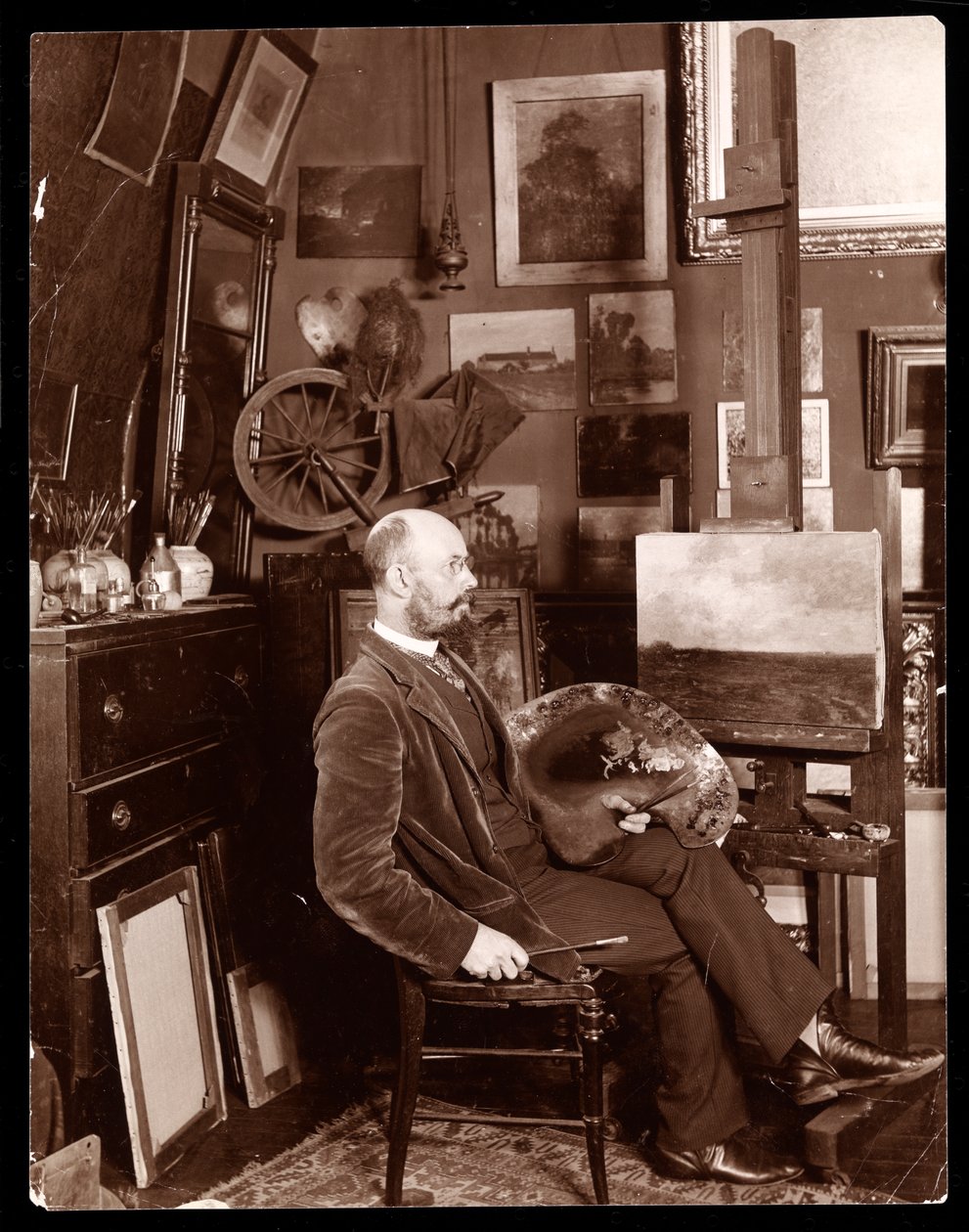 John Francis Murphy in seinem Studio im Chelsea, West 23rd Street, New York, ca. 1895 (Silbergelatineabzug) von Byron Company