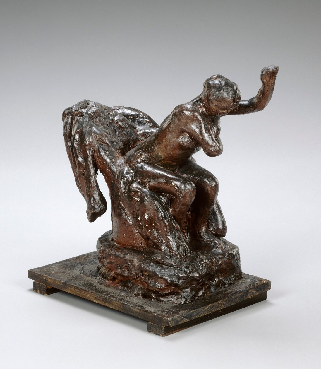 Frau, die in einem Sessel sitzt und ihre linke Achselhöhle abwischt, ca. 1890er von Edgar Degas