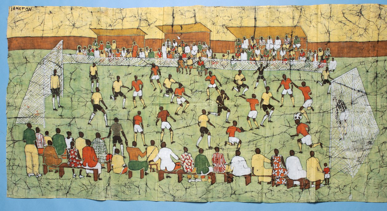 Afrikanisches Batik, das ein Fußballspiel mit Zuschauern auf den Tribünen darstellt von English School