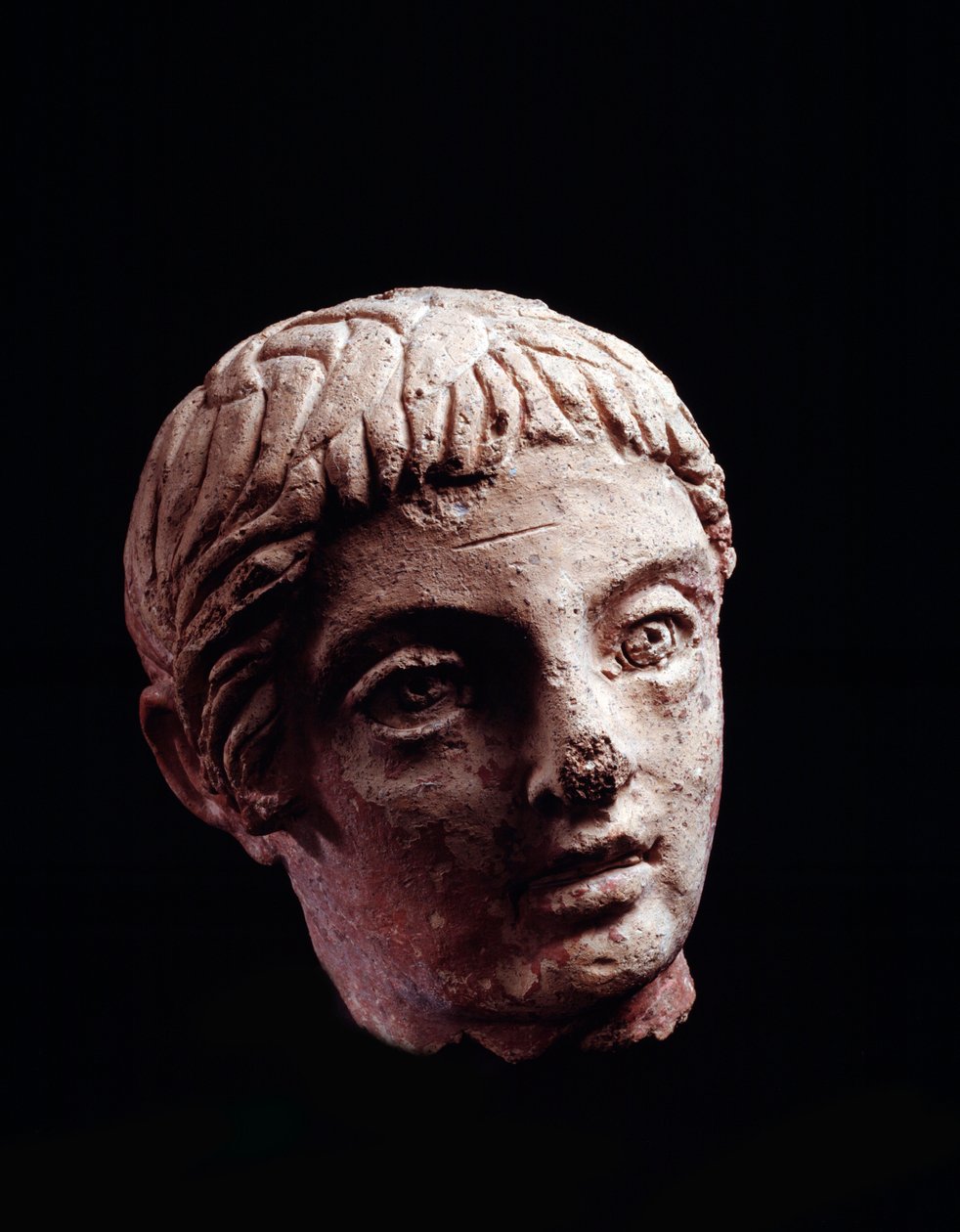 Etruskische Zivilisation: Kopf eines jungen Mannes aus dem Tempel von Belvedere in Orvieto - 5.-4. Jahrhundert v. Chr. Durchmesser 13 cm von Etruscan