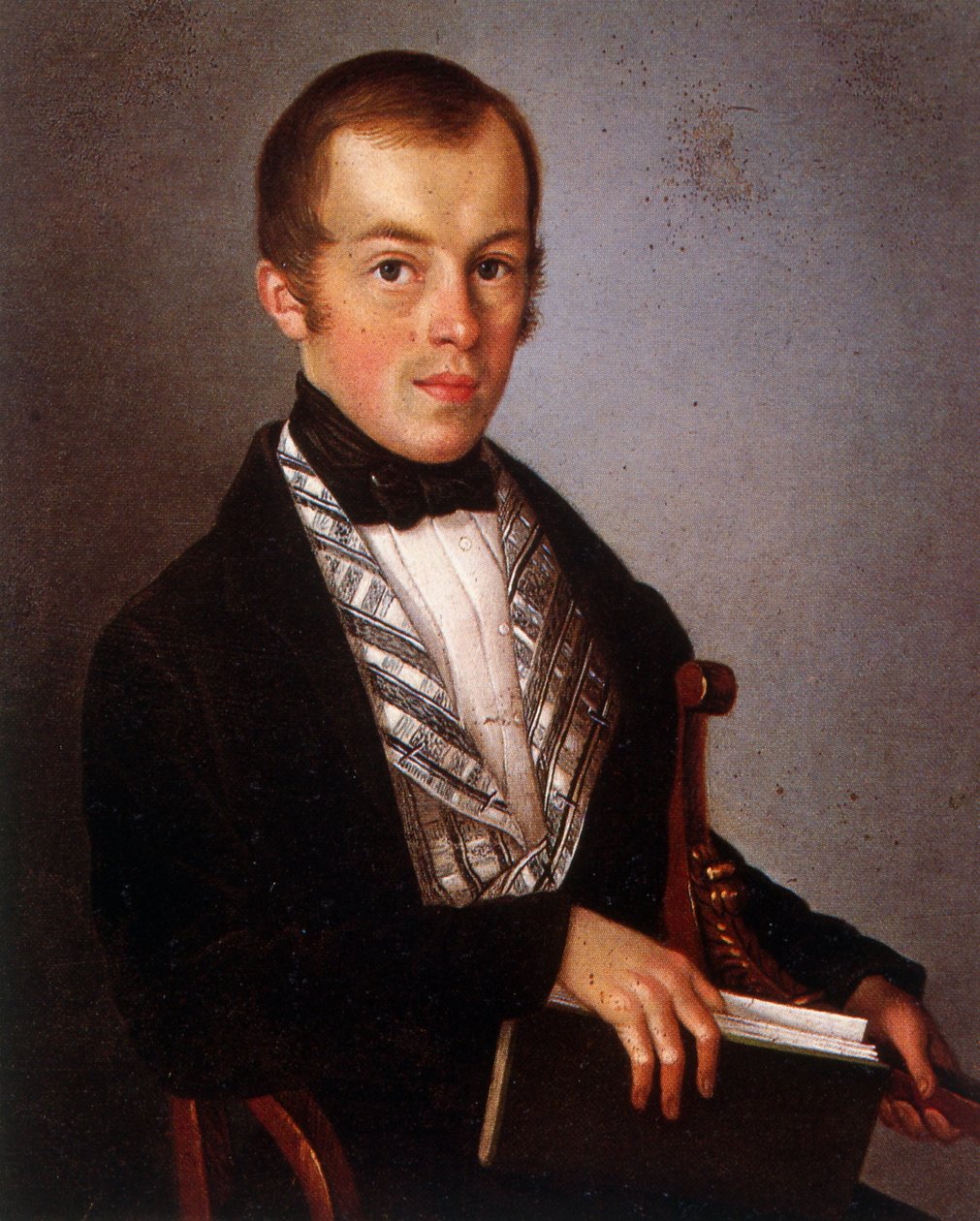 Ein Mann mit einem Buch in der Hand von French School