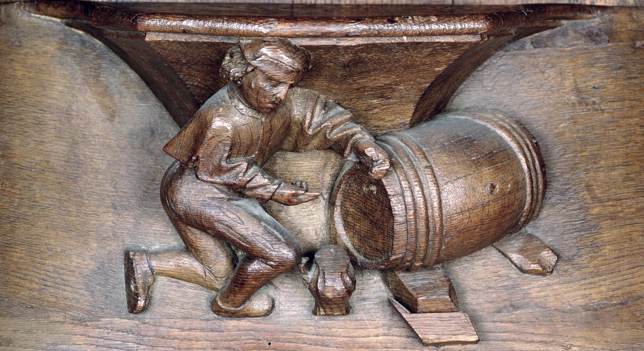 Schnitzerei, die einen Mann zeigt, der einen Zapfhahn auf ein Fass setzt, aus einem Chorgestühl der Abtei St. Lucien in Beauvais (Holz) von French School