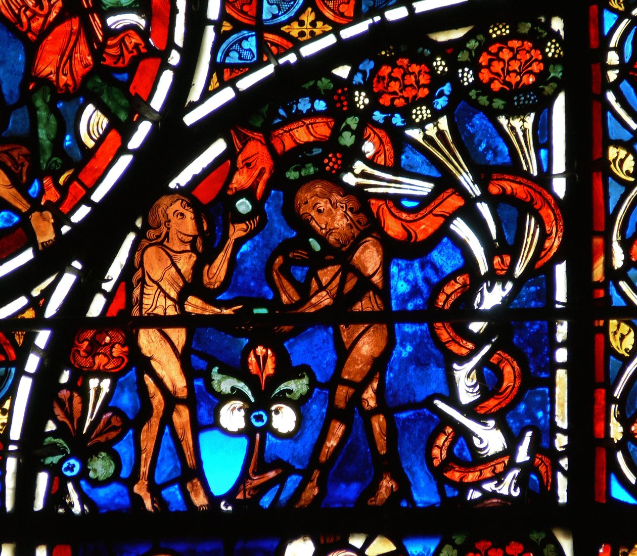 Detail eines Fensters, das das Gleichnis vom barmherzigen Samariter darstellt: Adam und Eva werden von der Schlange versucht (Detail) von French School