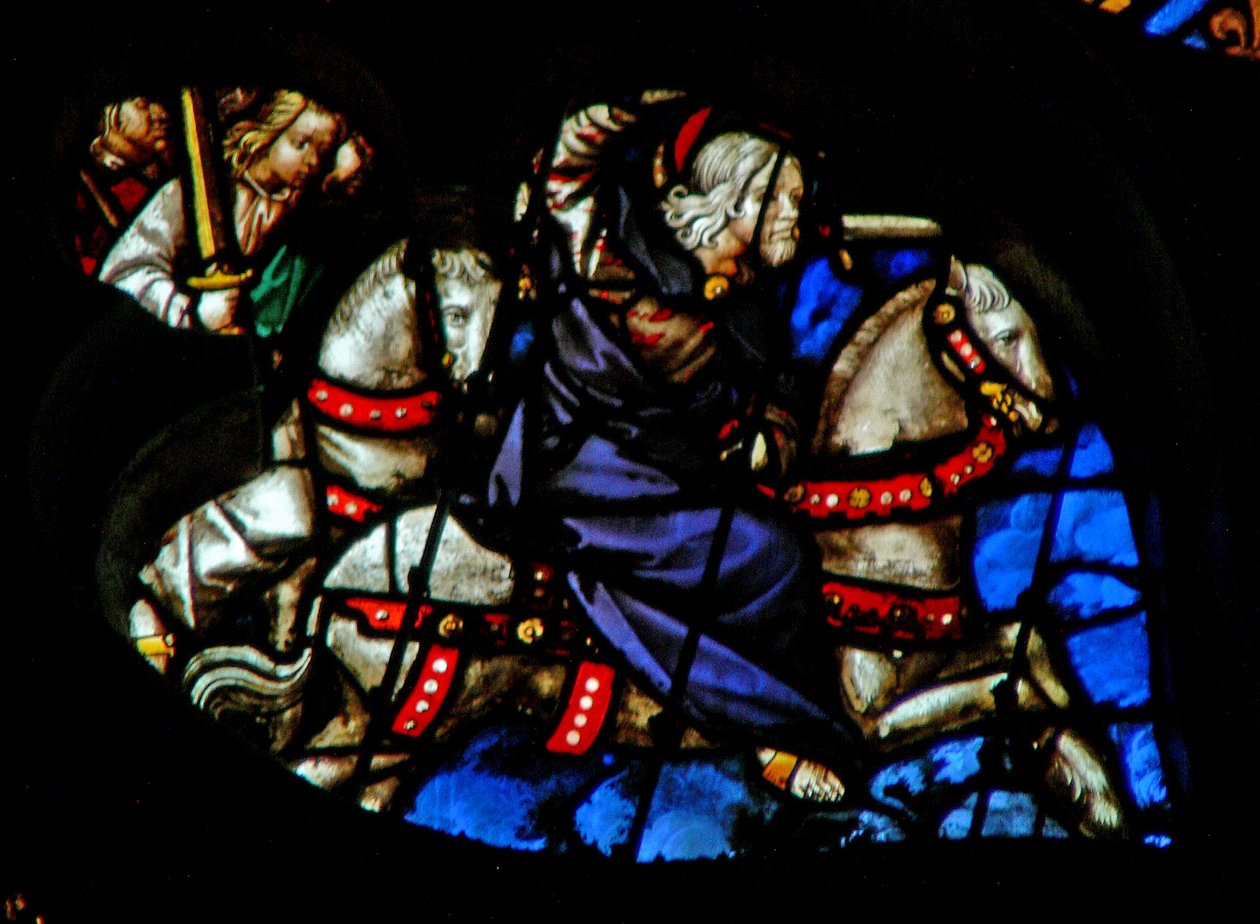 Das Westrosenfenster zeigt eine Szene aus dem Buch der Offenbarung: Treu und wahrhaftig, der König der Könige auf einem weißen Pferd, mit zwei weiteren Kriegern dahinter (19:11-16). von French School