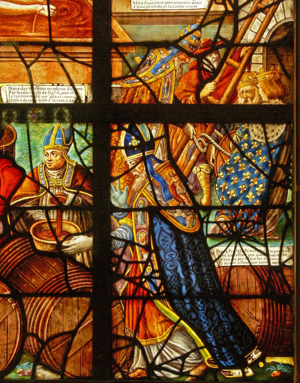 Fenster im Charnier (w.11) zeigt ein Detail aus der mystischen Weinpresse. von French School