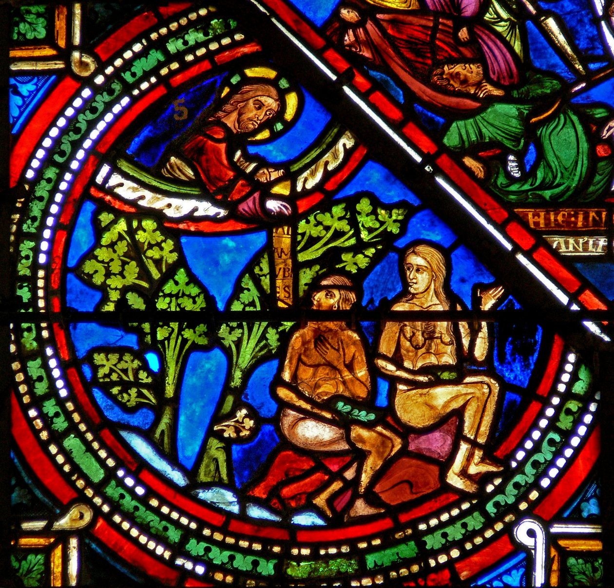 Fenster w15 zeigt das Fenster des barmherzigen Samariters: Adam und Eva bedecken ihre Nacktheit von French School