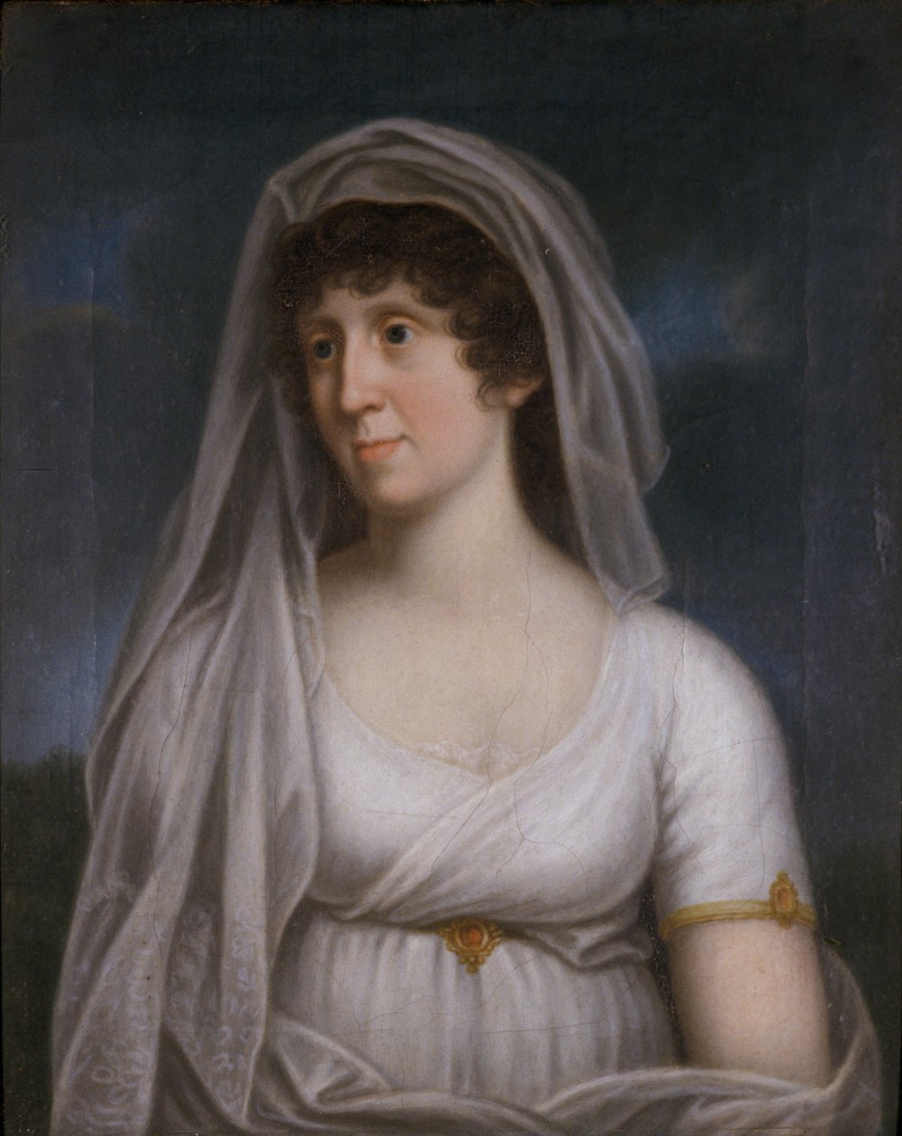 Frau in einem weißen Kleid mit Schleier von German School