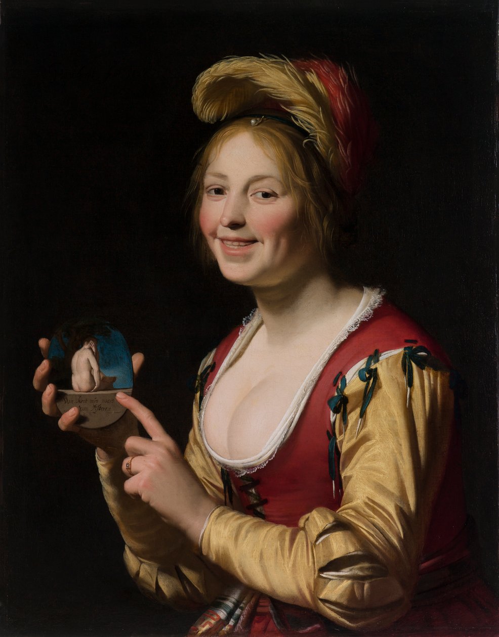 Lächelndes Mädchen, eine Kurtisane, die ein obszönes Bild hält von Gerrit van Honthorst