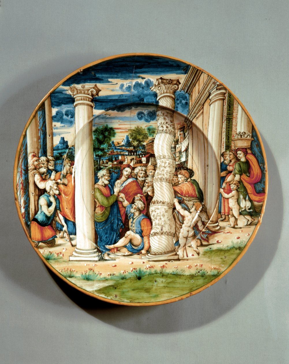 Schale mit Darstellung von St. Peter und St. Johannes, wie sie den Lahmen am Tempel heilen, ca. 1540-50 (Majolika) von Guido Di (workshop of) Merlino