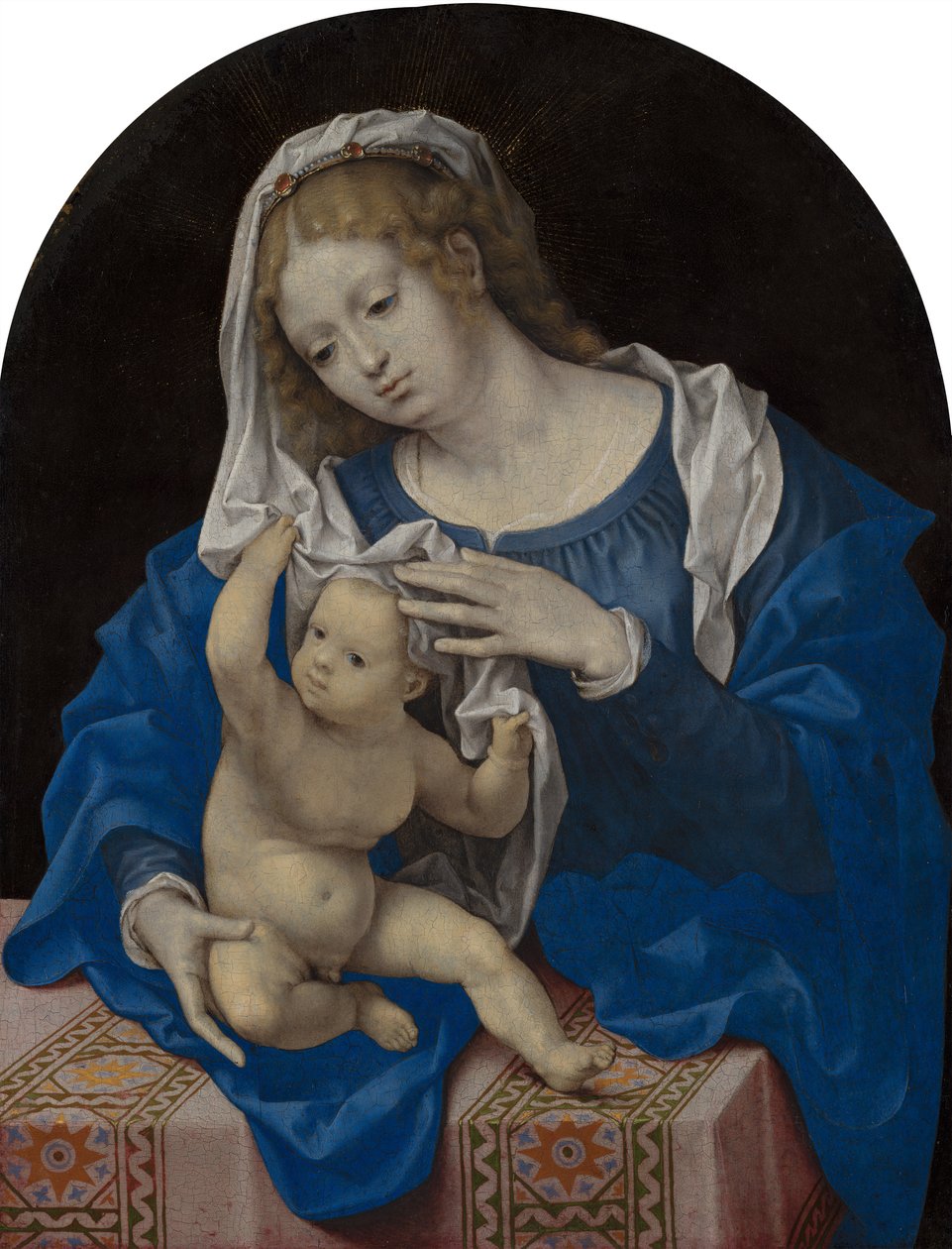 Madonna und Kind spielen mit dem Schleier von Jan Gossaert