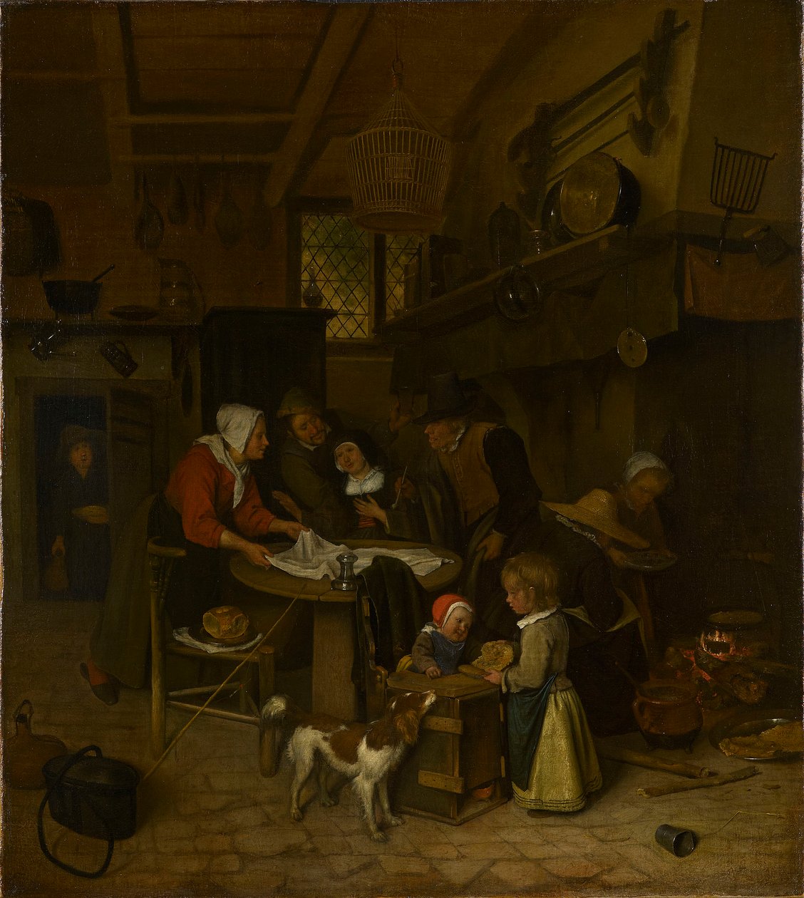 Eine Szene in einer Bauernküche mit einem Diener, der den Tisch deckt von Jan Steen