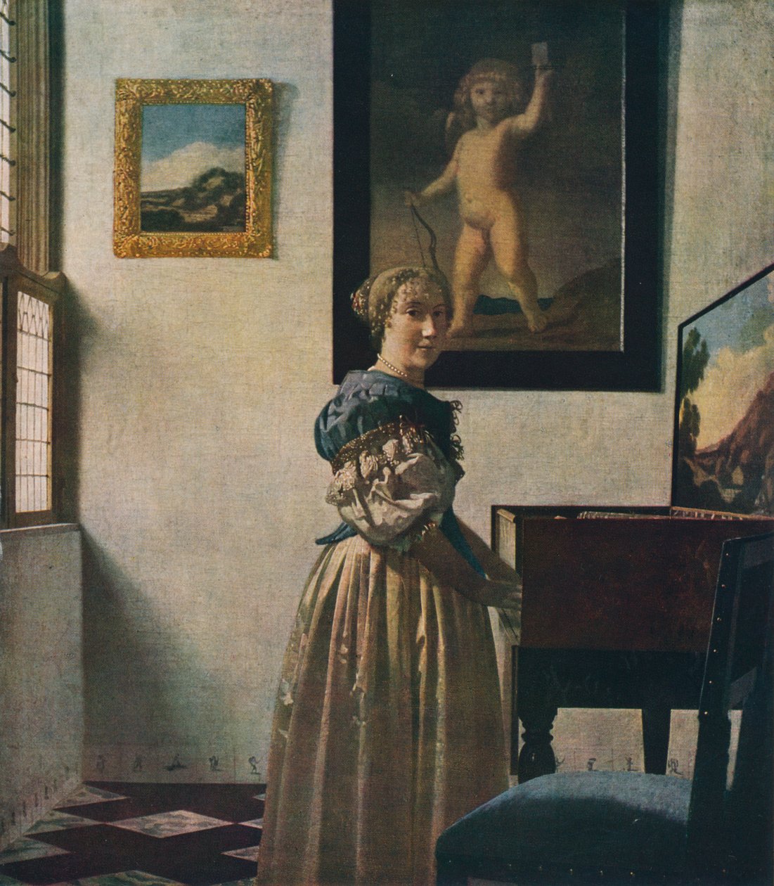 Eine junge Frau steht an einem Virginal, etwa 1670-1672 von Jan Vermeer van Delft
