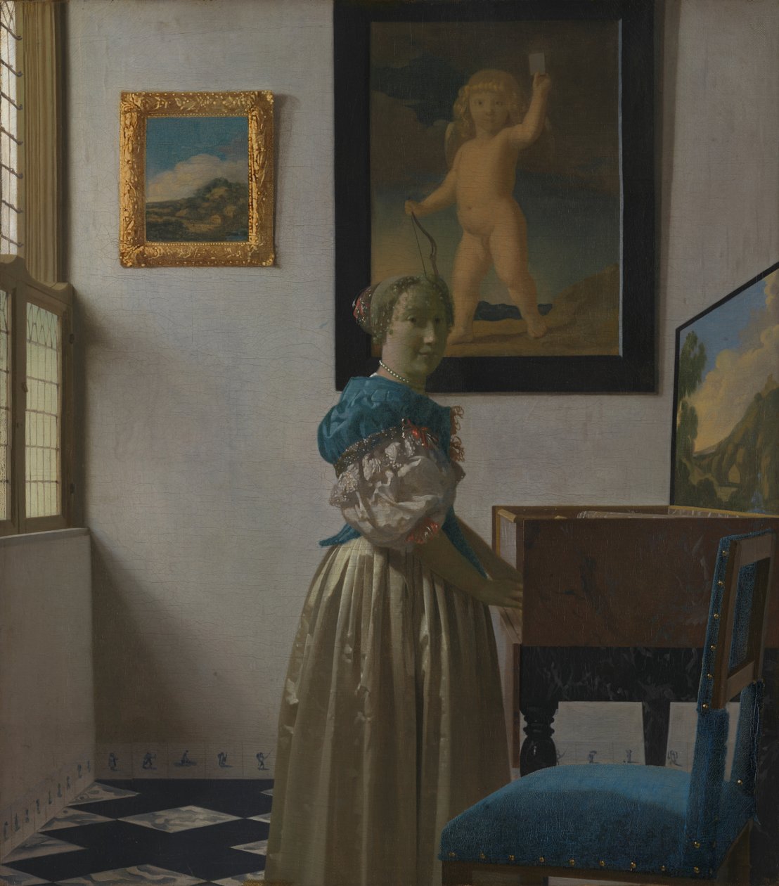 Eine junge Frau an einem Virginal von Johannes Vermeer