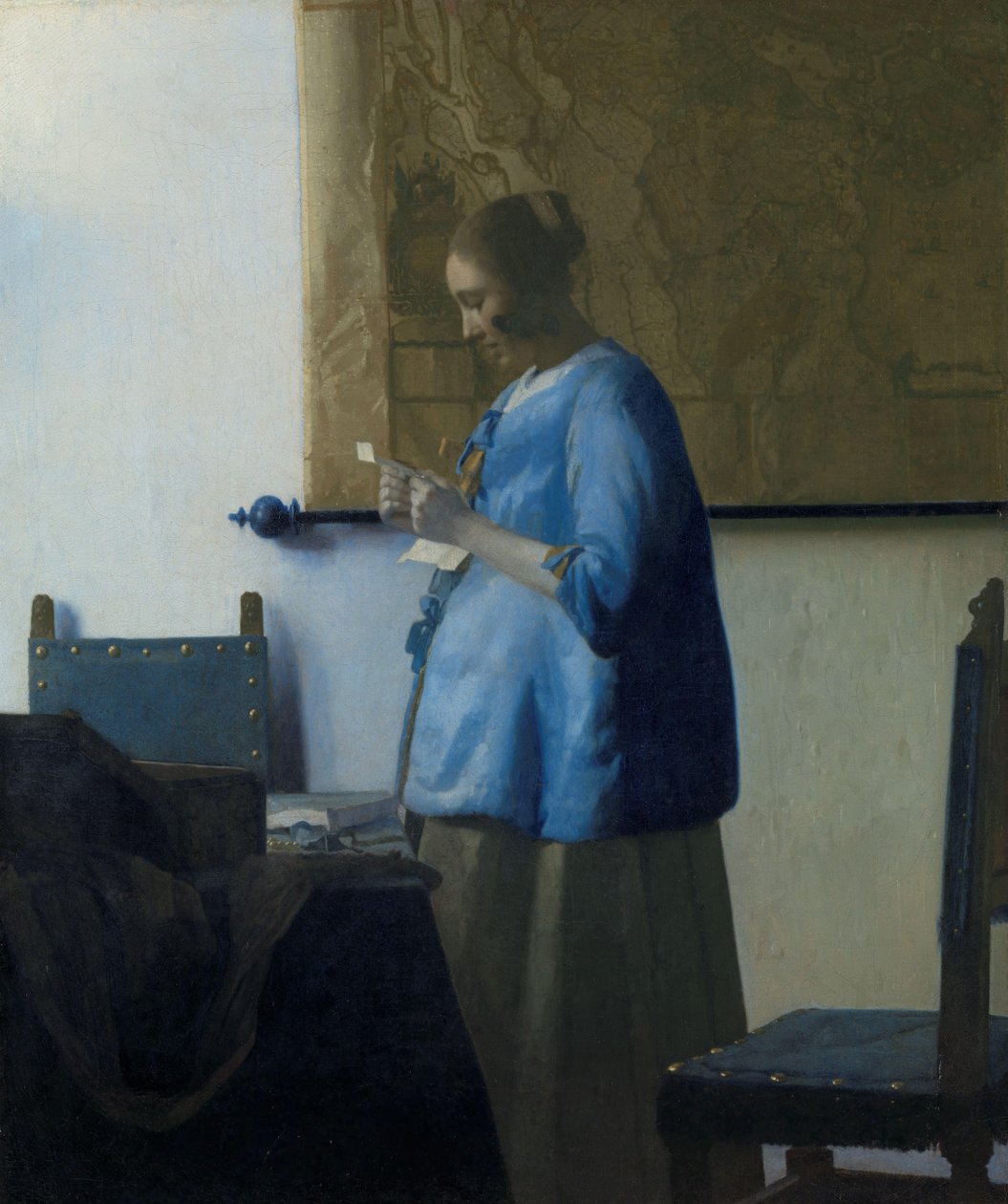 Frau in Blau, die einen Brief liest von Johannes Vermeer