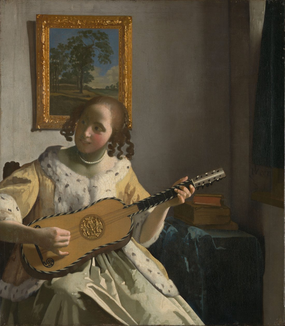 Junge Frau, die Gitarre spielt von Johannes Vermeer