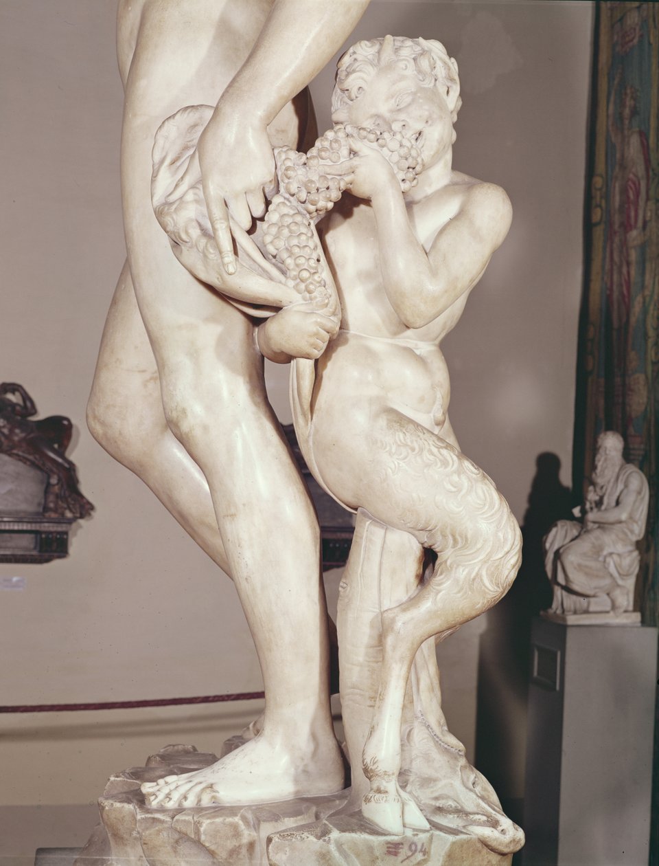 Bacchus mit einem jungen Faun (Detail des jungen Fauns) von Michelangelo Buonarroti