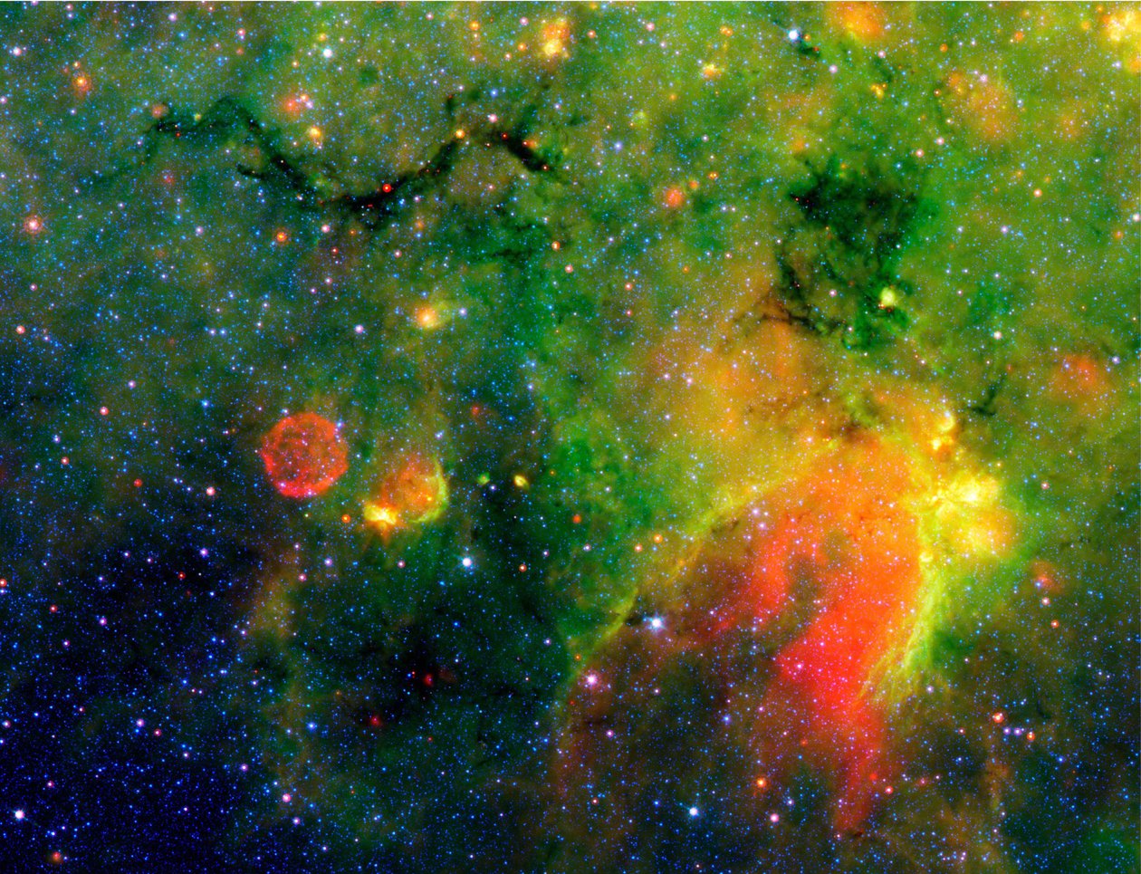 Spitzer-Weltraumteleskop-Infrarotbild einer Schlange (oben links) und der umliegenden stürmischen Umgebung. Es ist tatsächlich der Kern einer dicken, rußigen Wolke, die Dutzende von Sonnensystemen verschlingen könnte. NASA. von National Aeronautics and Space Administration National Aeronautics and Space Administration