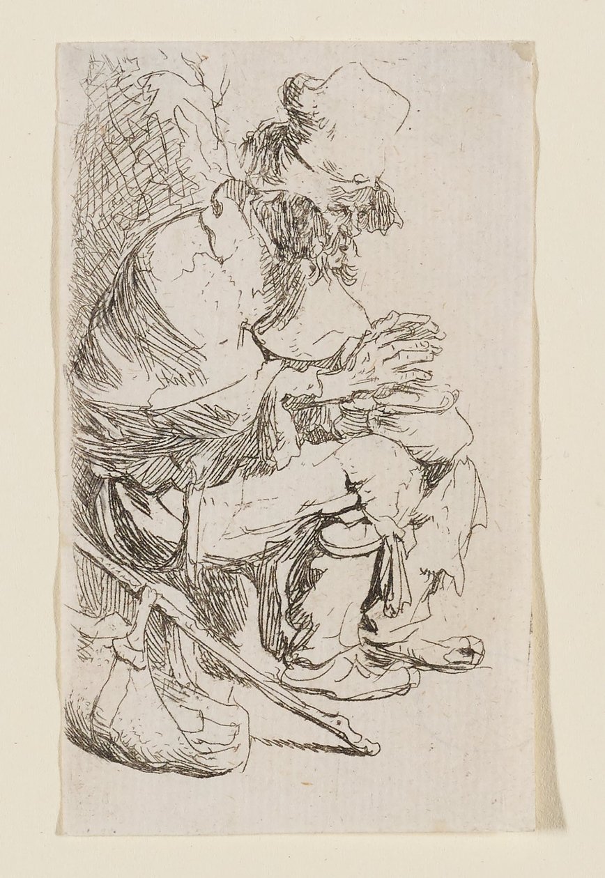 Bettler, der seine Hände an einer Feuerpfanne wärmt von Rembrandt van Rijn