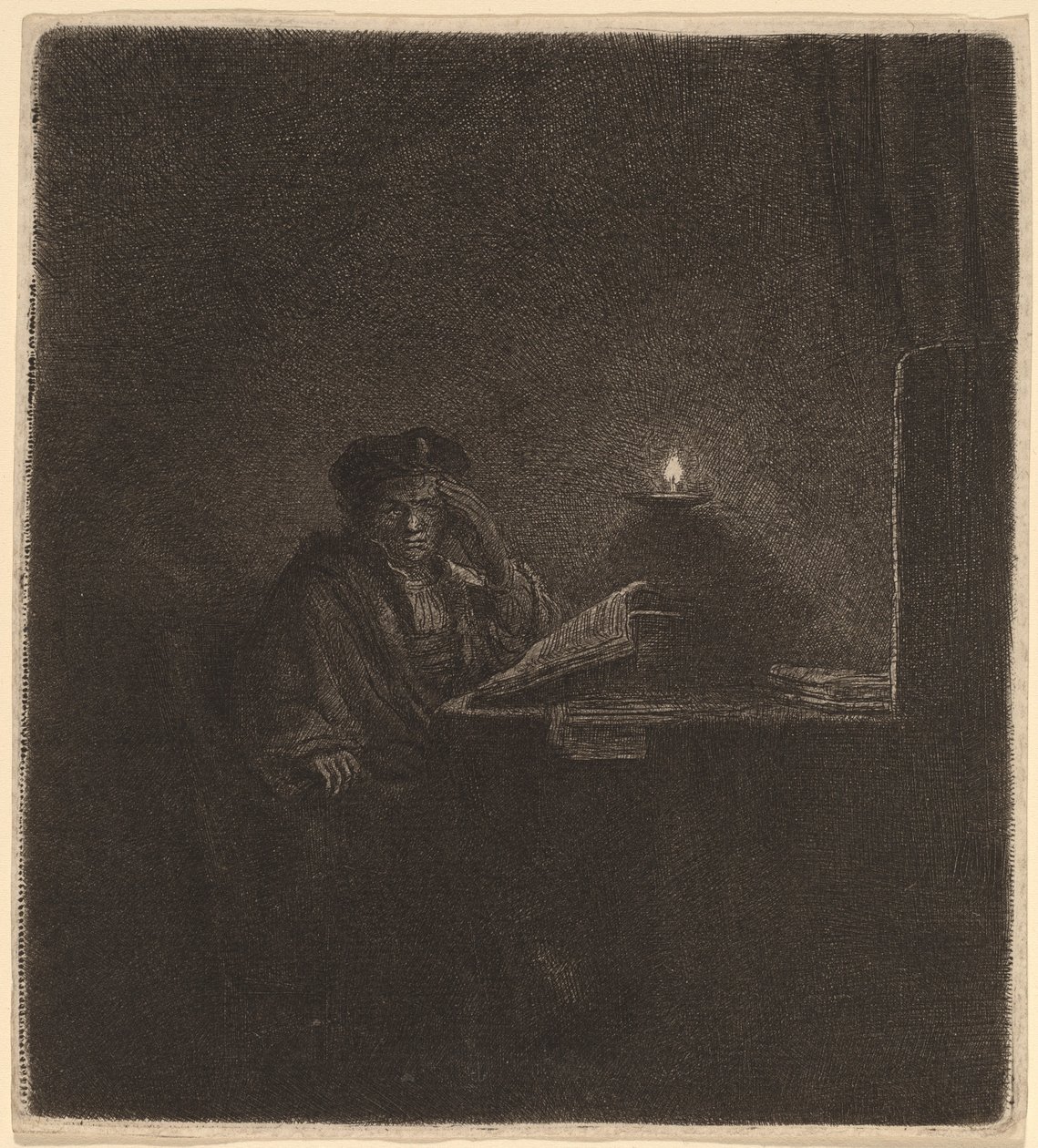 Student an einem Tisch bei Kerzenlicht von Rembrandt van Rijn