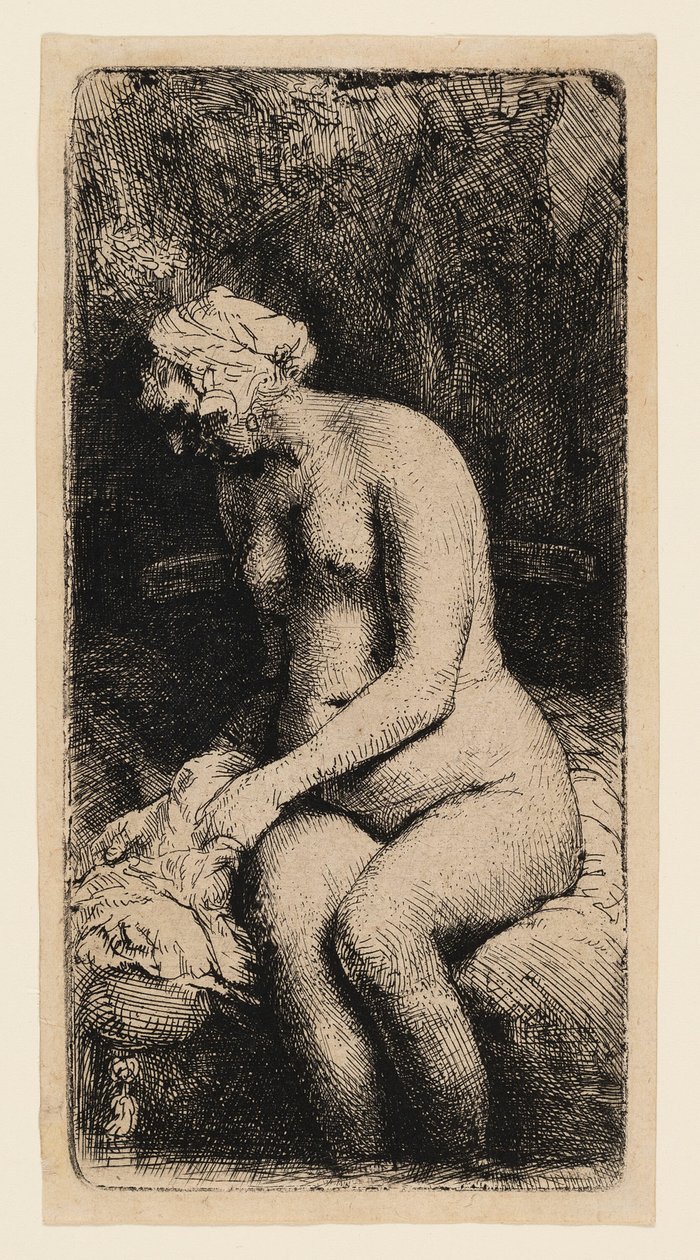 Frau badet ihre Füße an einem Bach von Rembrandt van Rijn