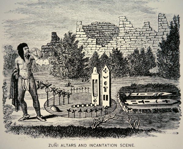 Zuni-Stammesangehöriger bläst Pollen über ein Pueblo-Heiligtum von School American