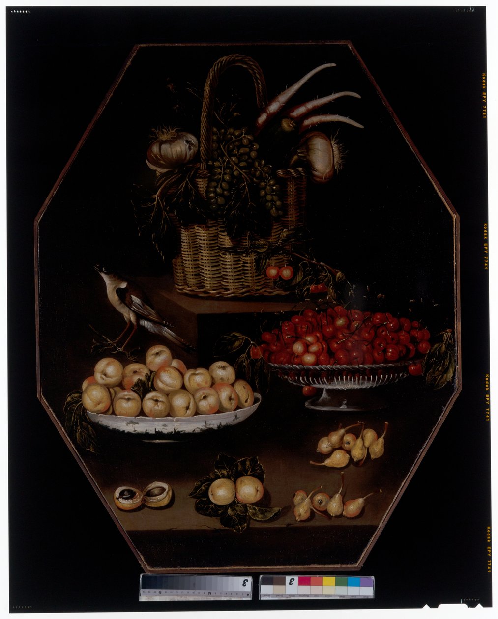 Stillleben mit Granatäpfeln und Trauben in einem Korb von Spanish School