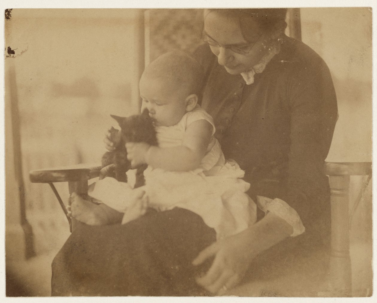 Frances Crowell und Kind mit Kätzchen von Thomas Eakins