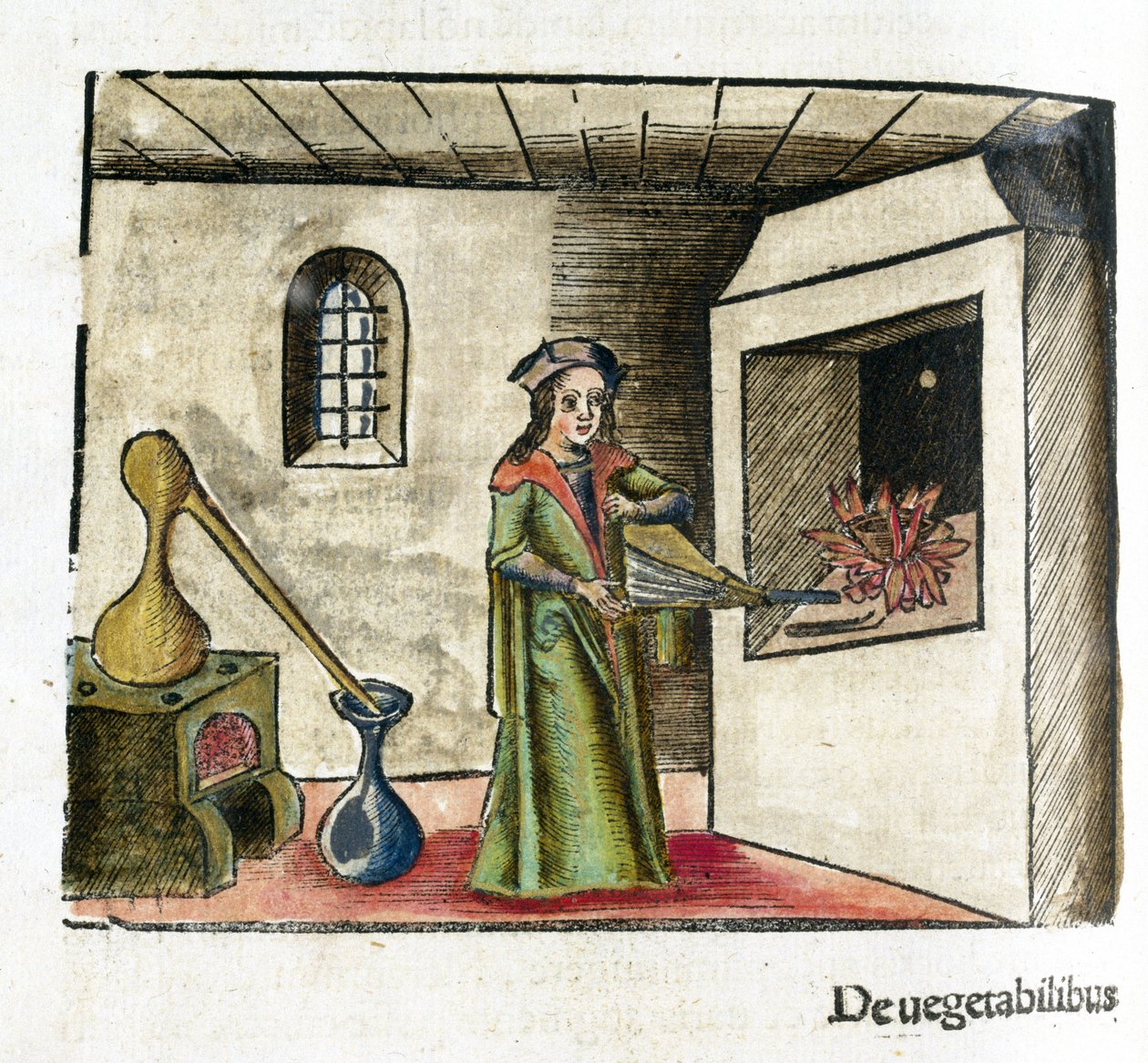 Alchemie 16. Jahrhundert: ein Alchemist bei der Arbeit, der einen Blasebalg vor dem Kamin seines Ateliers betätigt, hinter ihm ein Ofen und ein Destillierkolben von Unbekannt