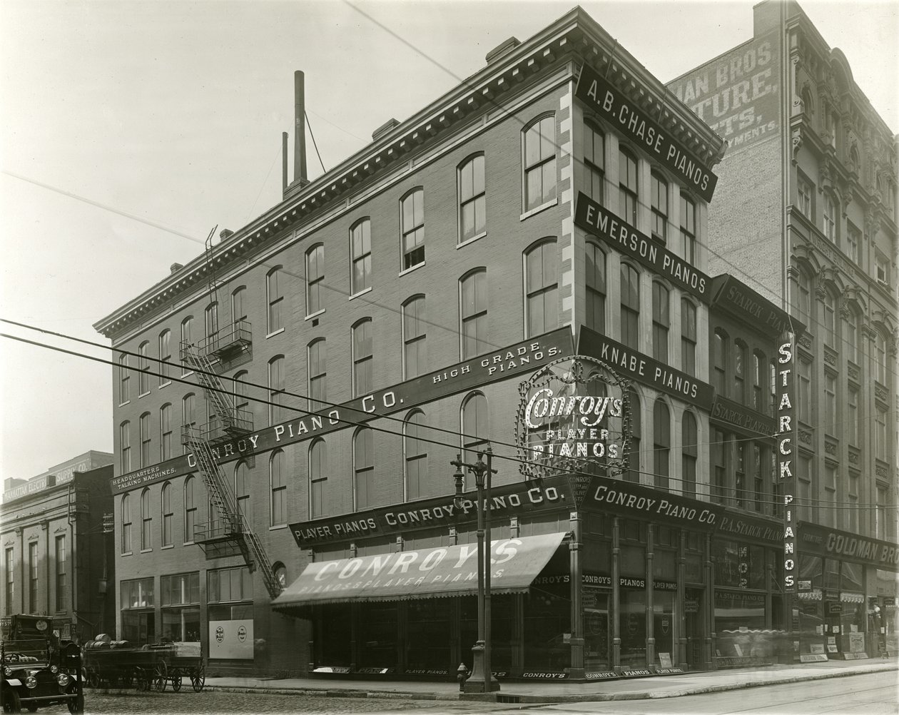 Conroy Piano Company, südöstliche Ecke der Eleventh und Olive Streets von Unknown