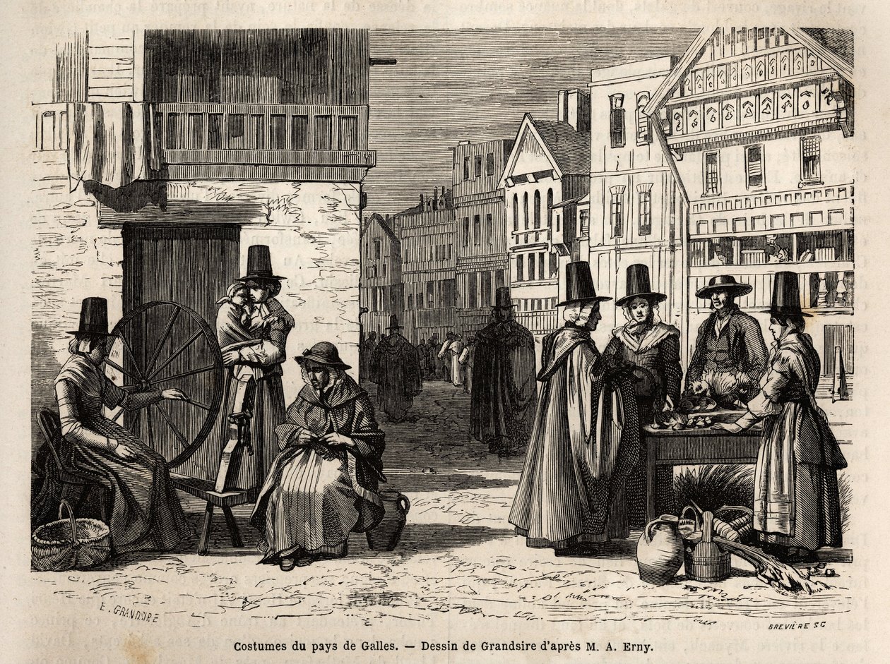 Eine Straße in Wales, mit Einheimischen in traditionellen Kostümen und alltäglichen Aktivitäten: eine Familie und Frauen, die Wolle mit Rädern spinnen. Gravur zur Illustration einer Reise in das Land Wales, 1862, von Alfred Erny, in „Le tour du monde, nouv von Unknown artist