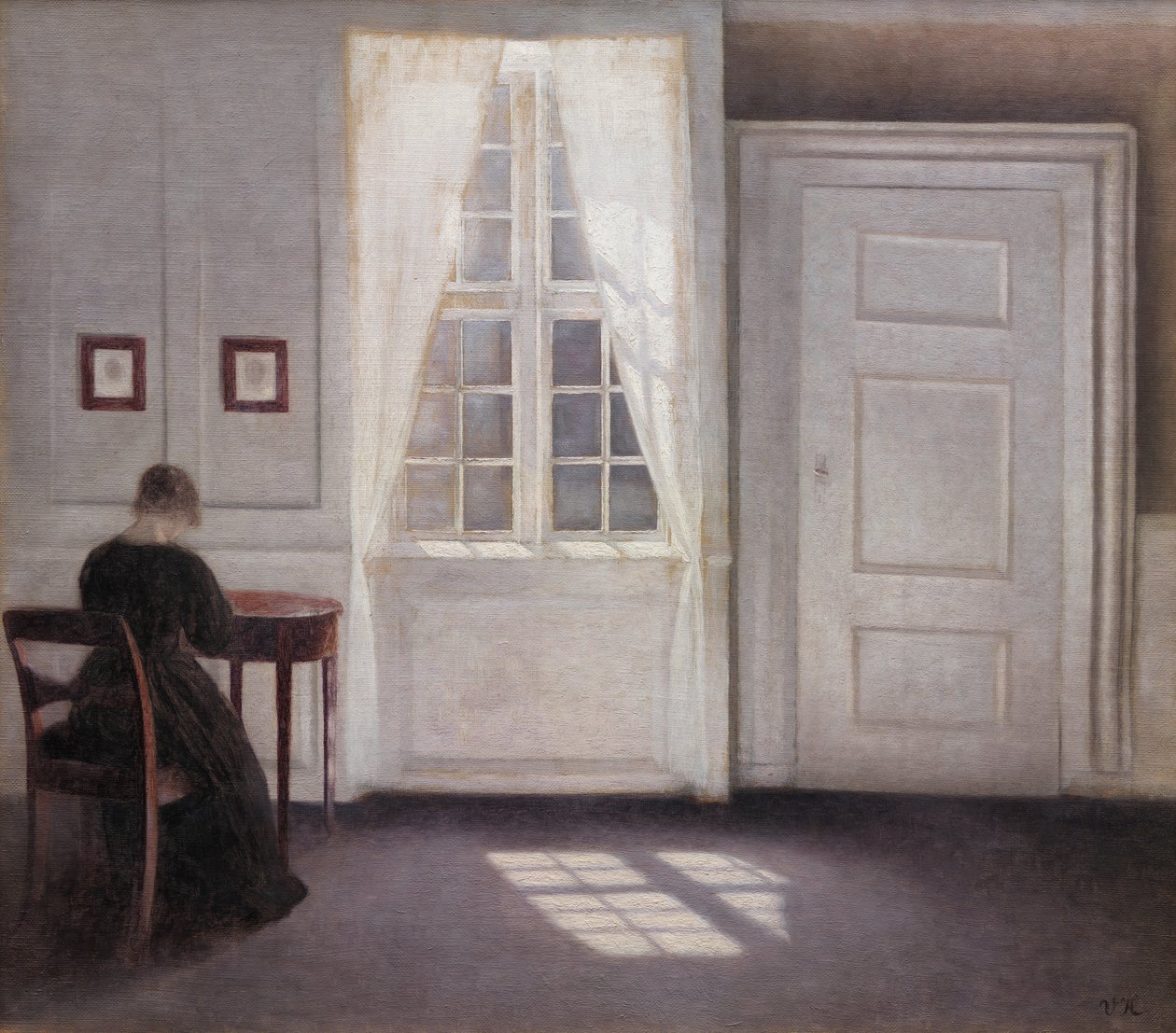 Ein Zimmer im Haus des Künstlers in Strandgade, Kopenhagen, mit der Frau des Künstlers von Vilhelm Hammershøi