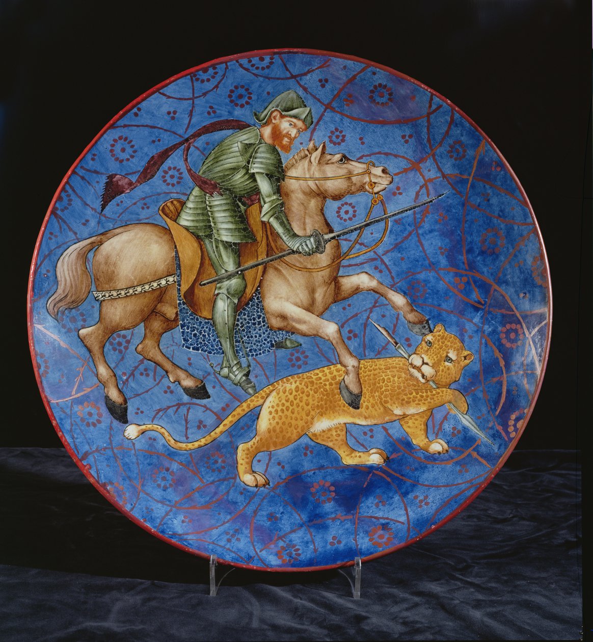 Ladegerät mit einem berittenen Ritter, der versucht, einen Leoparden zu speeren von William de Morgan