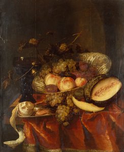 Früchte in einer Wanli Craak Porzellanschale mit einem Glas, Melone und Zinnteller