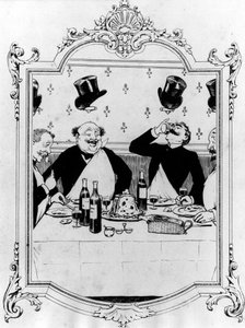 Vier Männer trinken während einer Mahlzeit in einem Restaurant