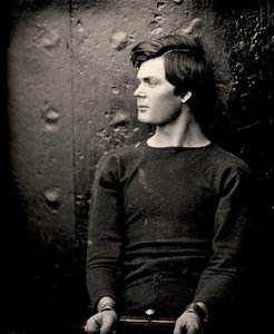Lewis Powell in Handfesseln an Bord der USS Saugus, 1865