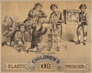 Kinder knien auf dem Boden und spielen mit Spielzeug von American School