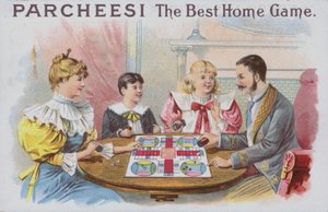 Familie spielt eine Partie Parcheesi von American School