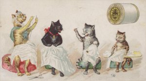 Vier beschäftigte Katzen beim Nähen von American School