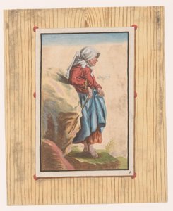 Stehende Frau mit nackten Füßen und Stock