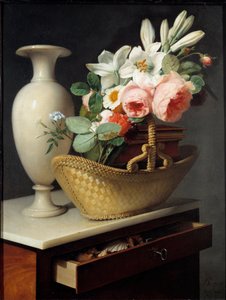 Blumenstrauß aus Lilien und Rosen in einem Korb
