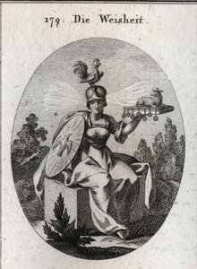 Allegorie der Weisheit. Seine Kleidung und seine weißen Waffen definieren seine Stärke und Reinheit. Der Hahn auf seinem Helm ist das Symbol seiner Intelligenz und Wachsamkeit. Die Lichtstrahlen, die aus seinen Schläfen kommen, bedeuten Würde und Heiligkei