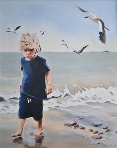 Strandjunge und Möwen