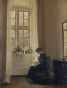 Ein Mädchen näht in einem Innenraum von Carl Holsoe