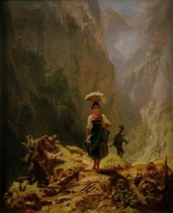 Dirndl und Jäger im Gebirge
