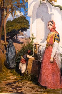 Orientalische Frau am Brunnen