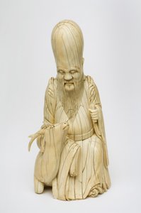 Geschnitzte Elfenbeinfigur von Shou Xing, sitzend mit Hirsch, ca. 1580-1644